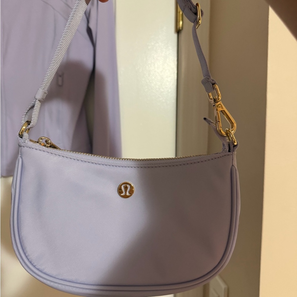 Authentic lululemon athletica lavender frost mini handbag purse used once!